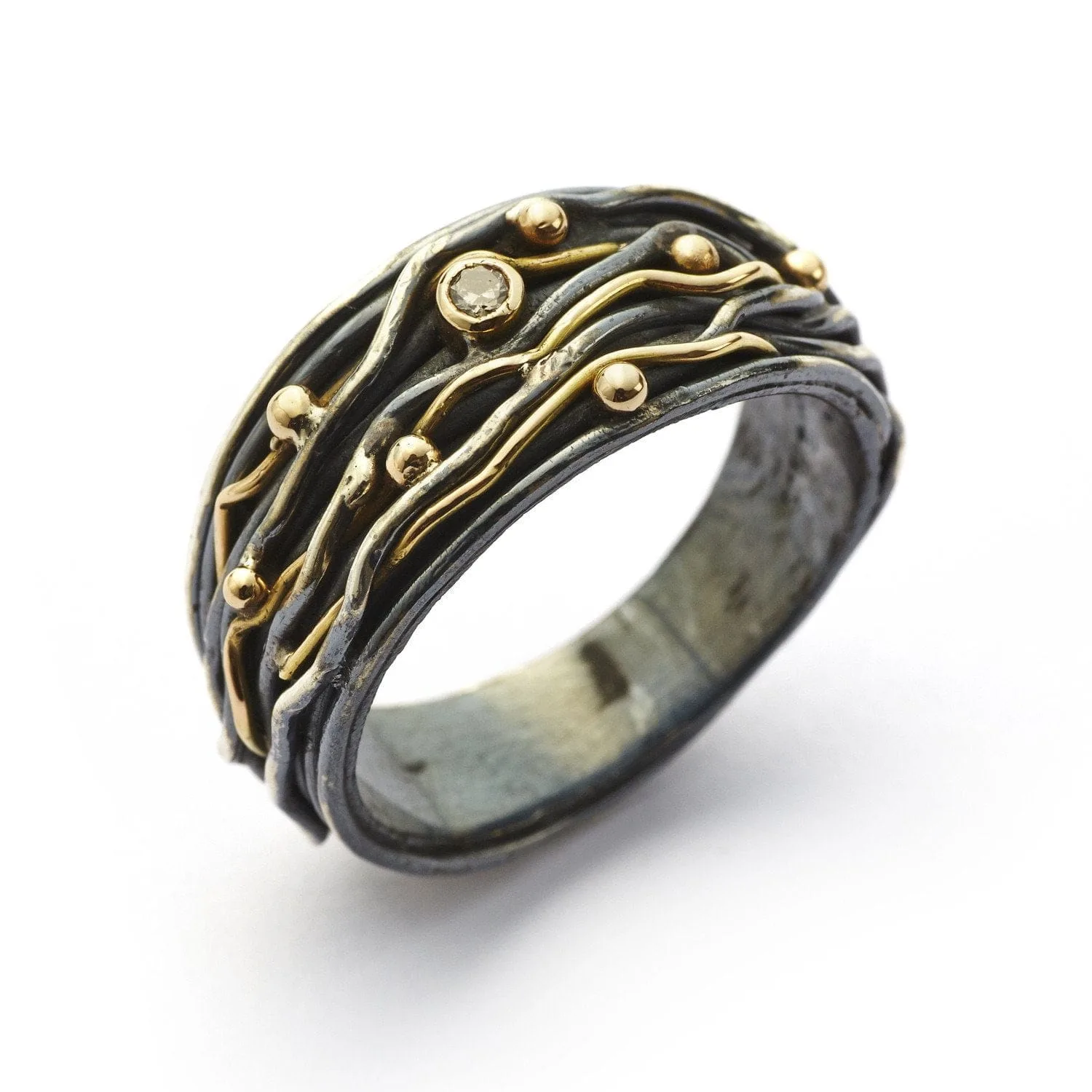 ring with many wires, gold balls and diamond