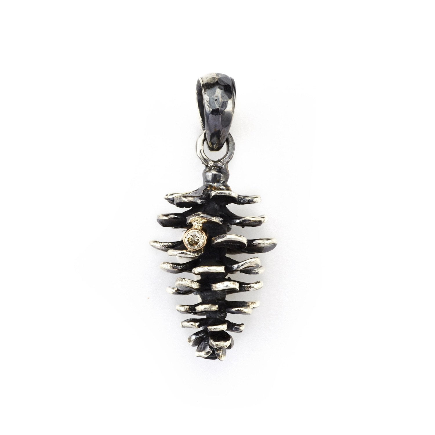 small nordic pine cone pendant jewellery of silver with a diamond
