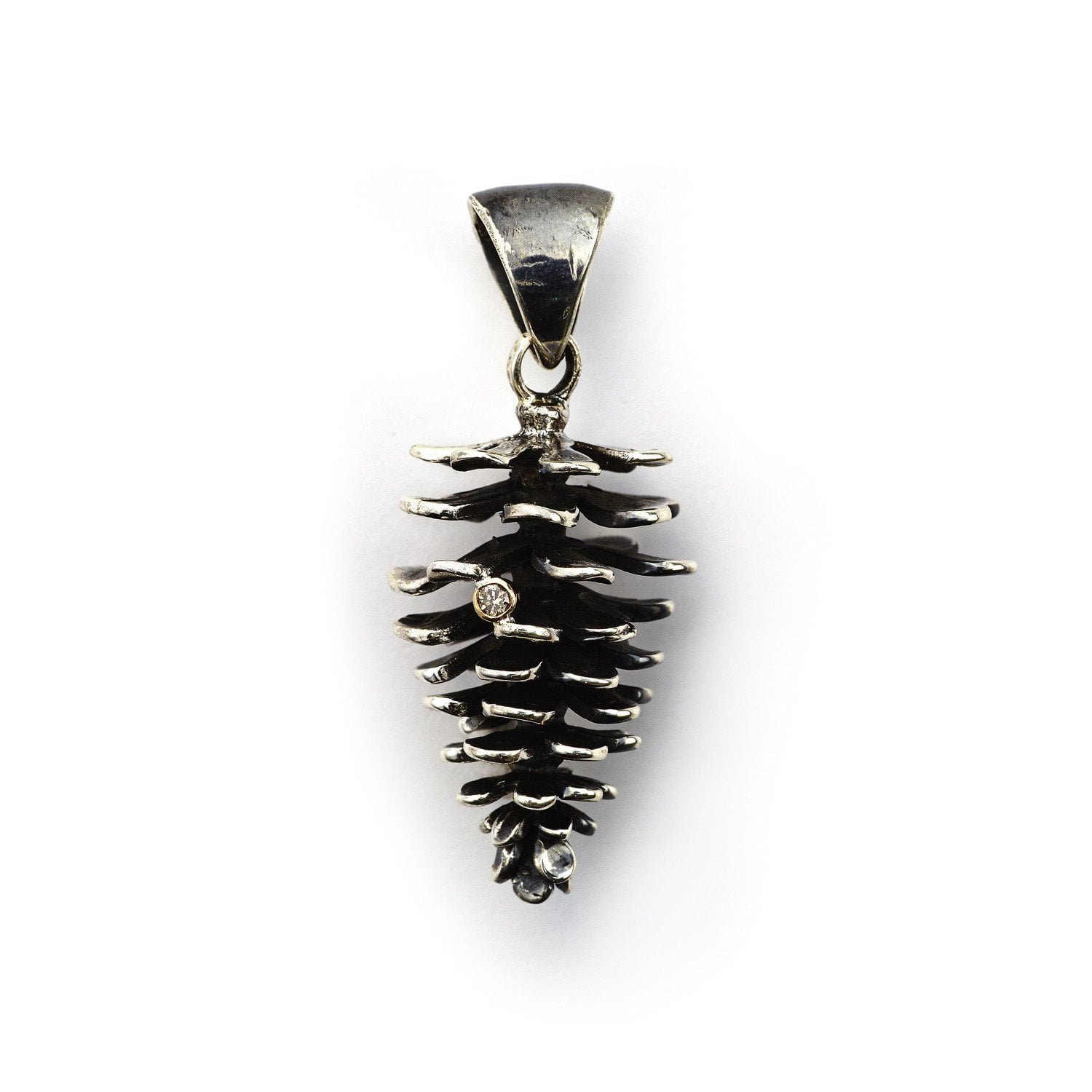 large nordic pine cone pendant jewellery of silver with a diamond