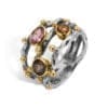 Unik flerfarvet ring med gyldne detaljer